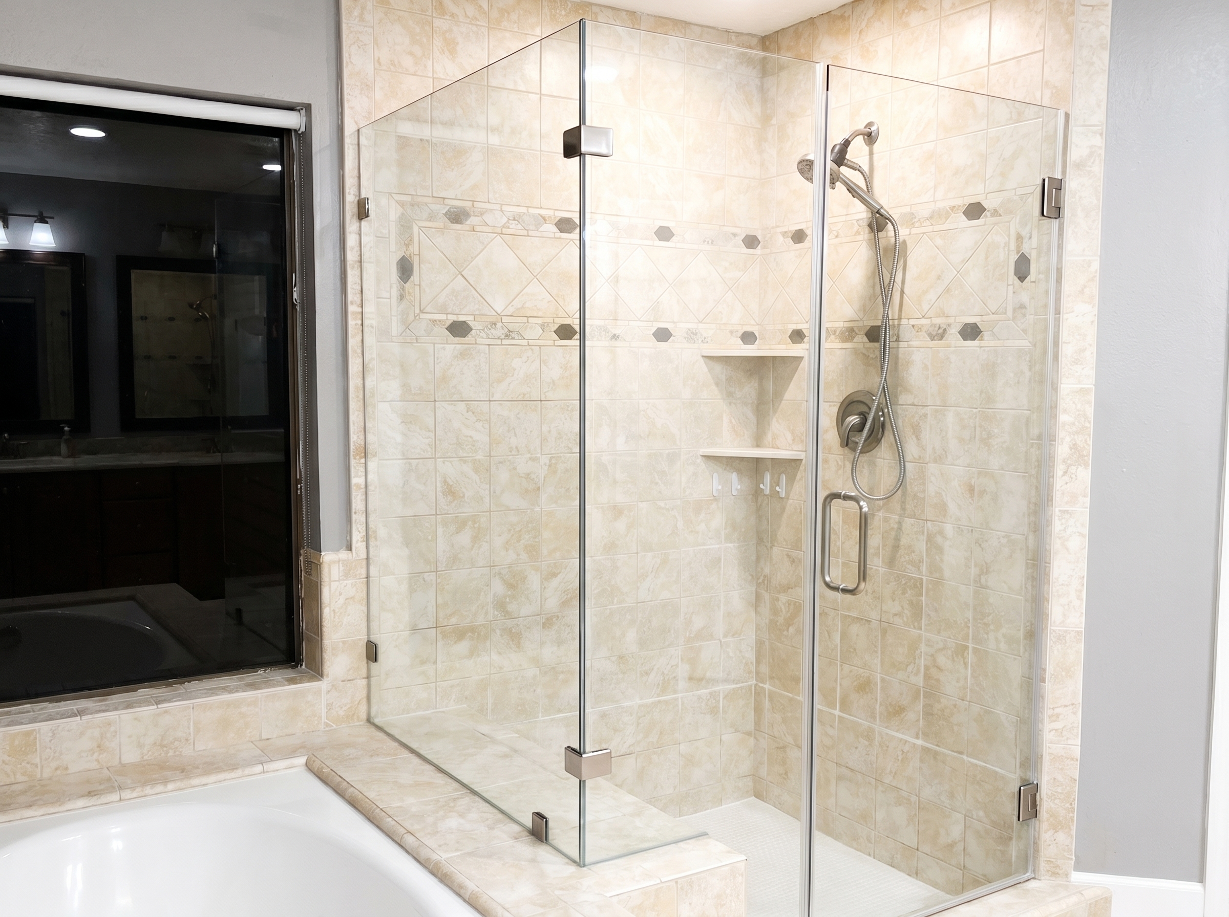 Frameless glass primary shower